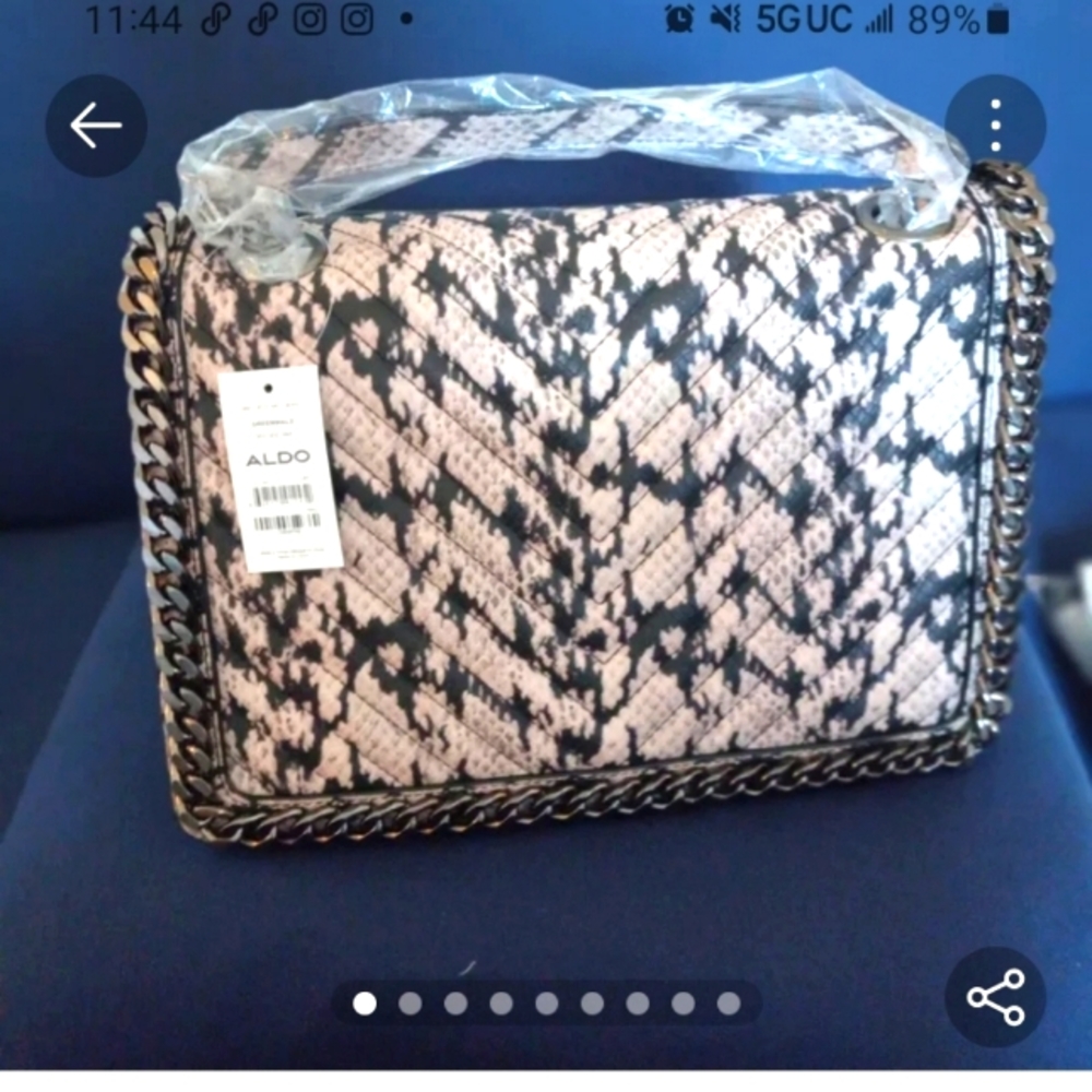 Aldo Snake embossed bag.